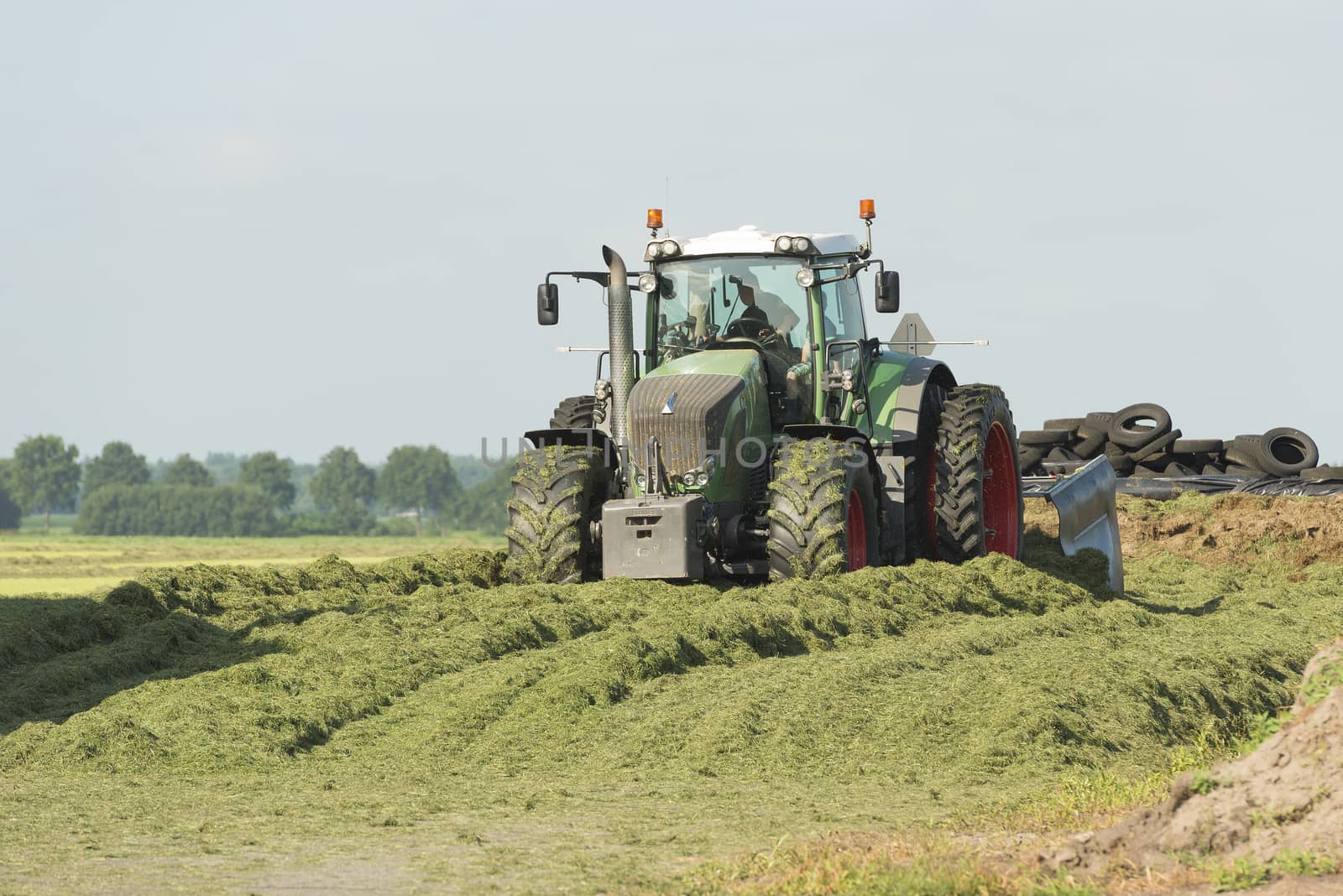 silage with a large tractor by Tofotografie