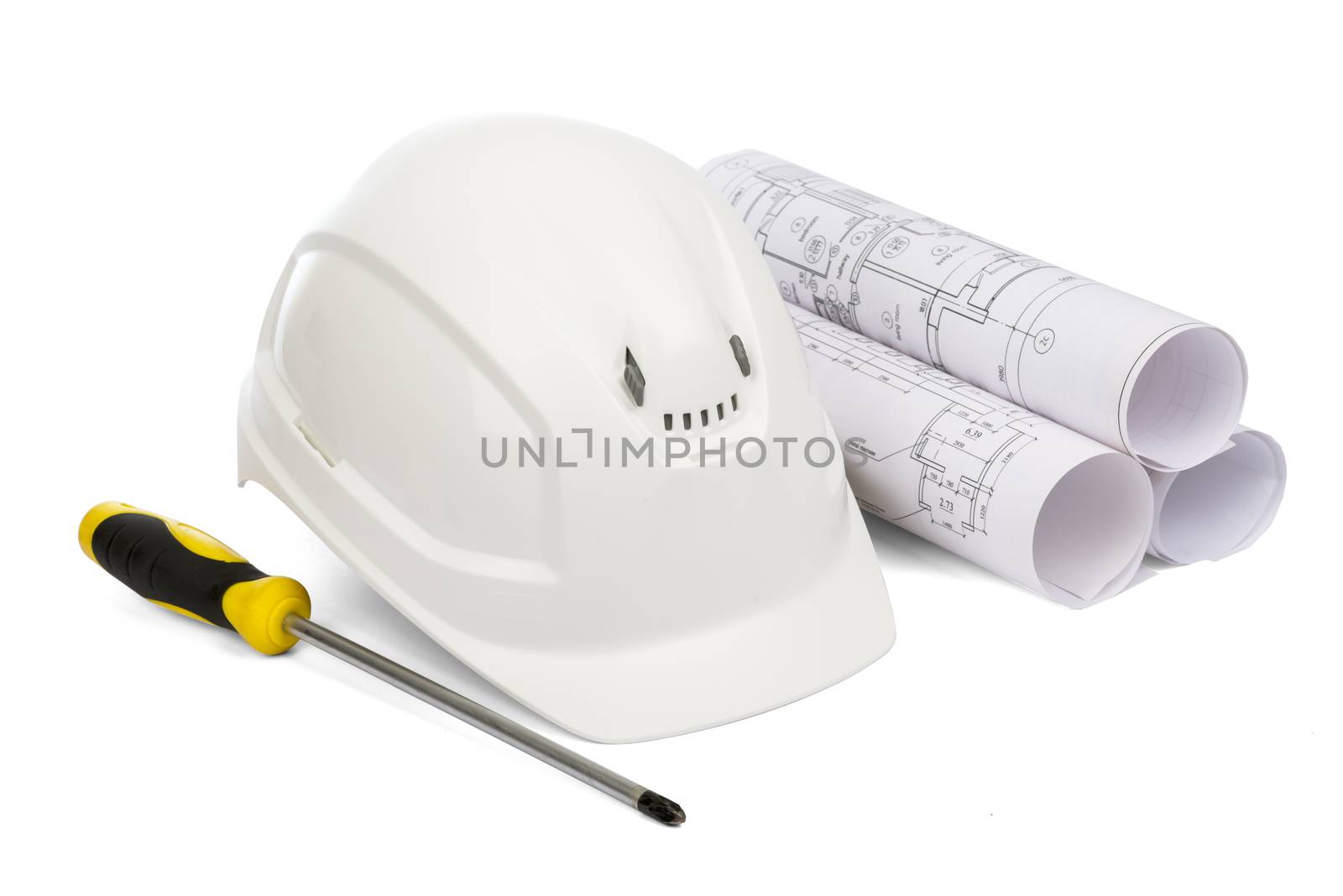 Safety helmet and screwdriver on isolated white background