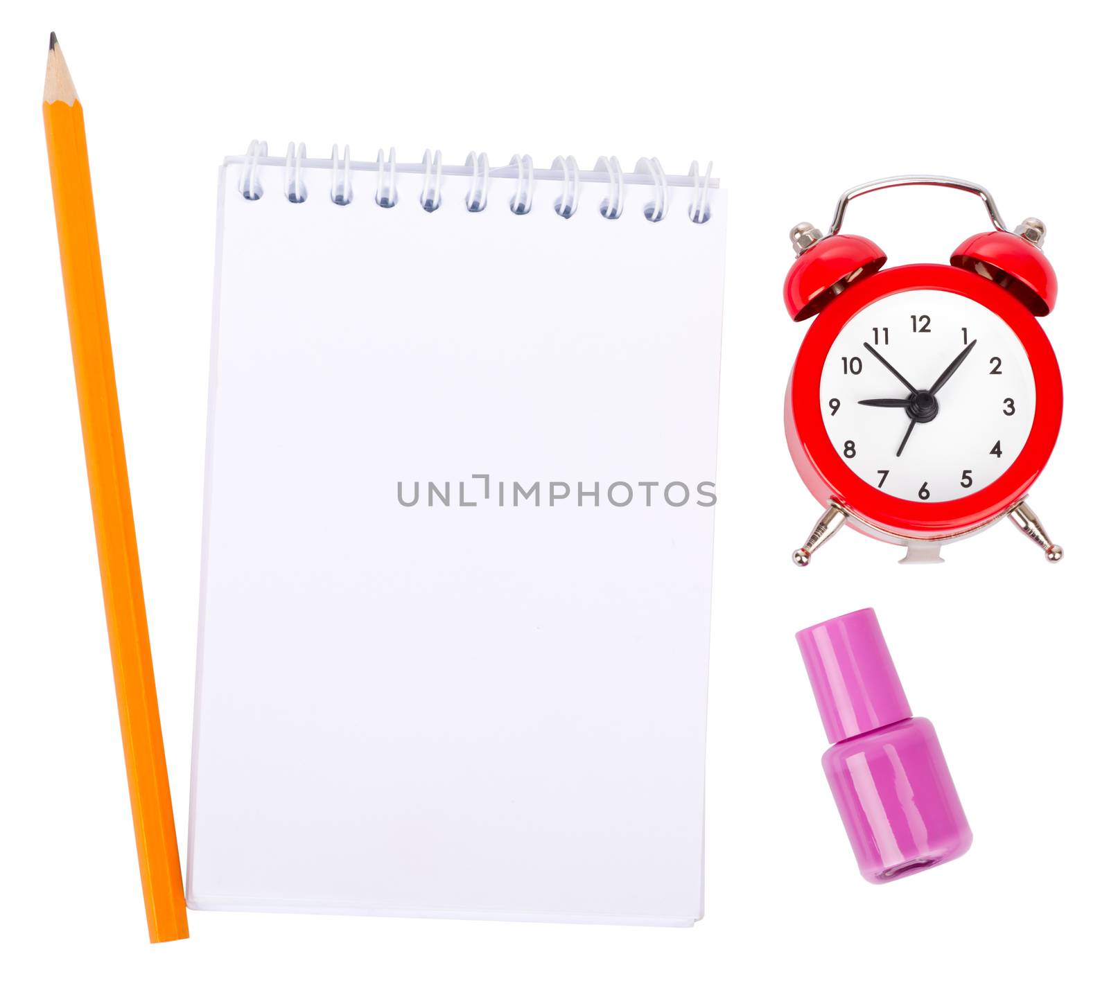 Open copybook with nail polish on isolated white background
