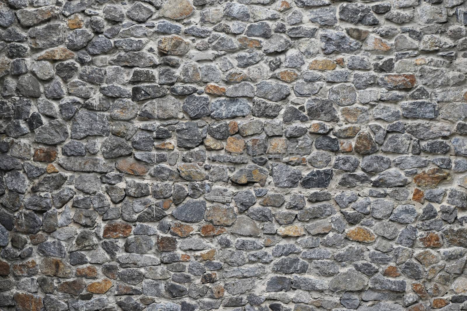 Old style rough stone rock wall texture