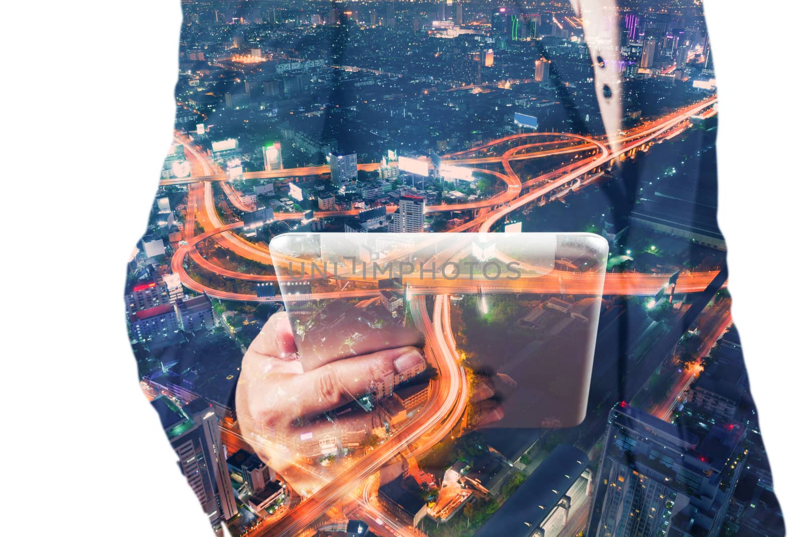 Double Exposure of BusinessMan hold Digital Tablet with Modern City Building and Highway as Digital Technology concept
