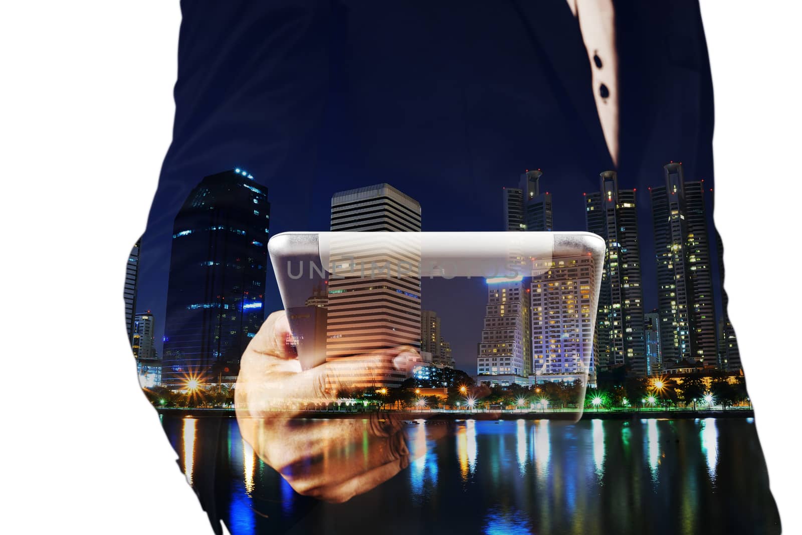 Double Exposure image of Businessman use Digital Tablet and City by thampapon