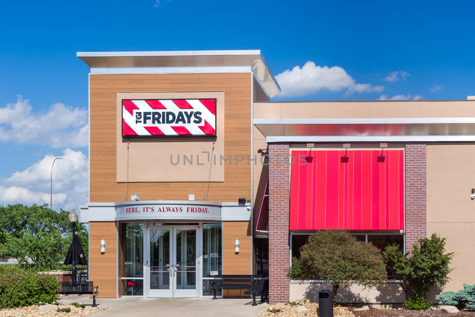 BLOOMINGTON, MN/USA - MAY 29, 2016: TGI Fridays exterior and logo. TGI Friday's is an American restaurant chain focusing on casual dining.