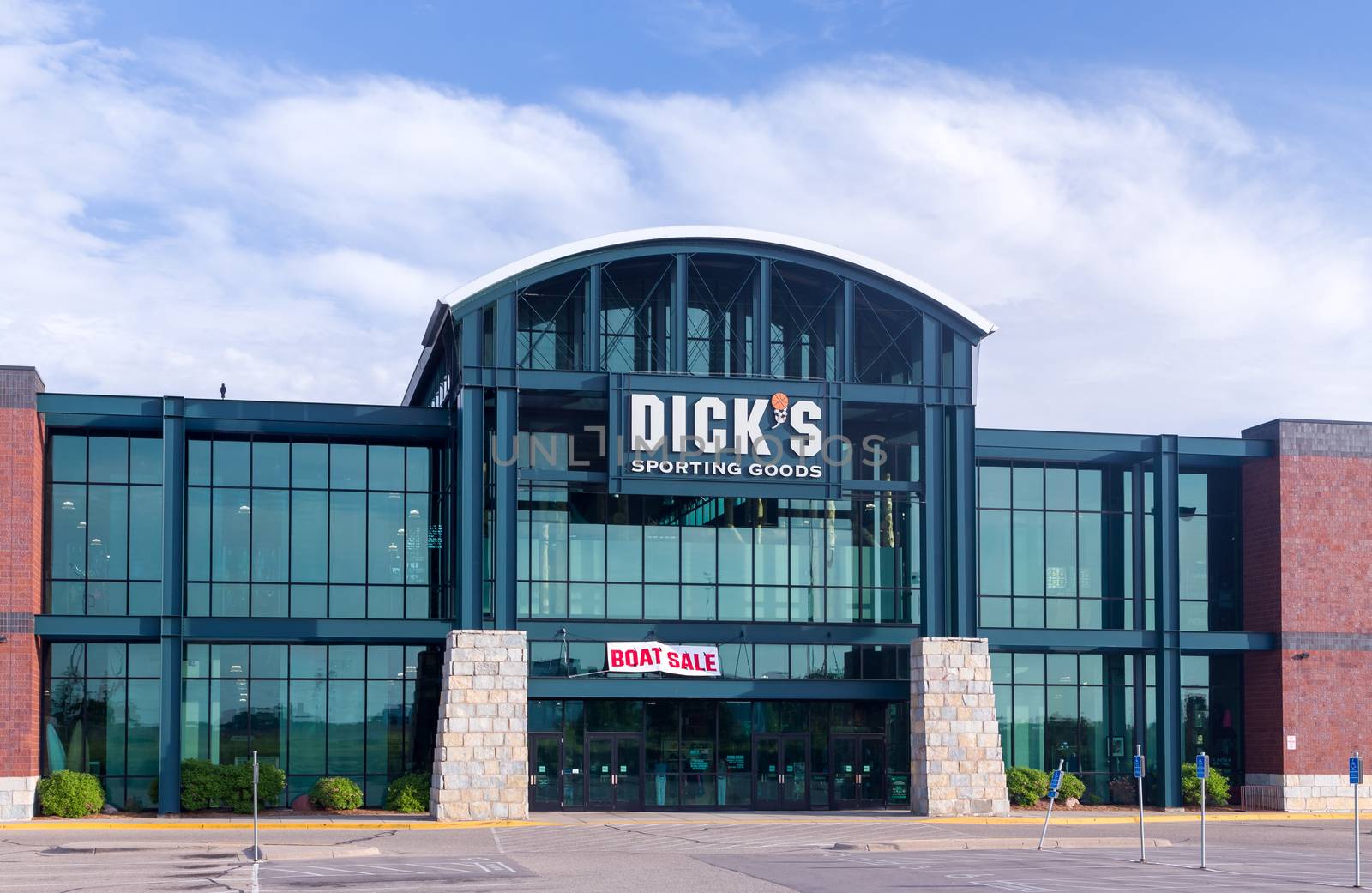 RICHFIELD, MN/USA - MAY 30, 2016: Dick's Sporting Goods exterior. Dick's Sporting Goods, Inc. is a Fortune 500 American corporation in the sporting goods and retail industries.