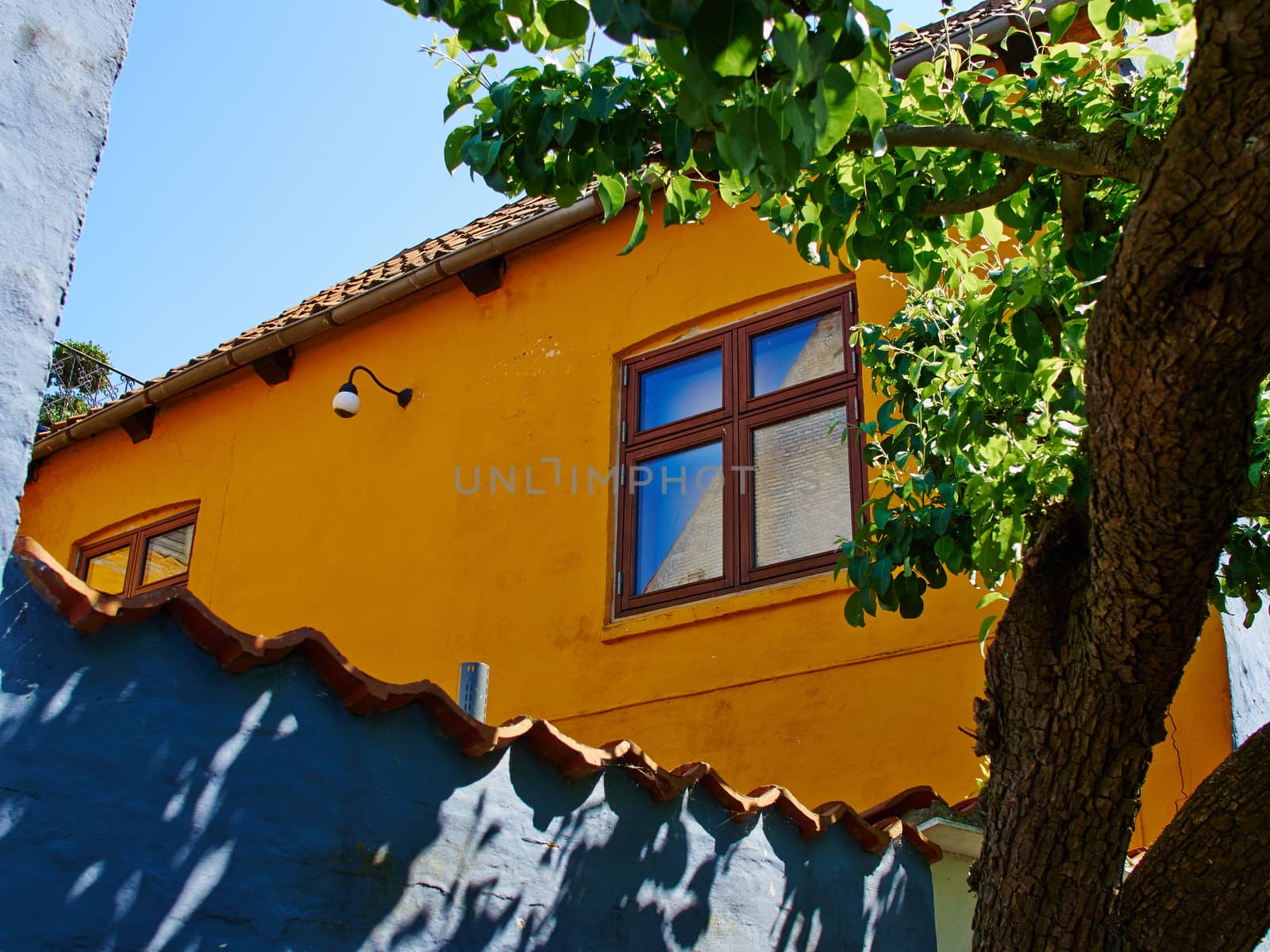 Typical small beautiful street with old traditional Danish style houses Faaborg Denmark