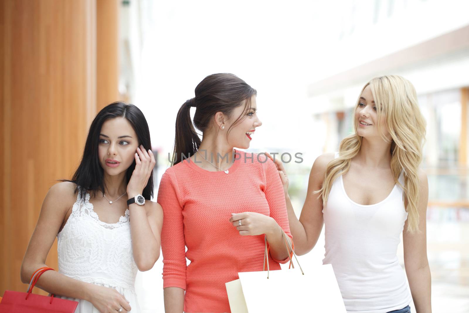 Women shopping in mall by ALotOfPeople