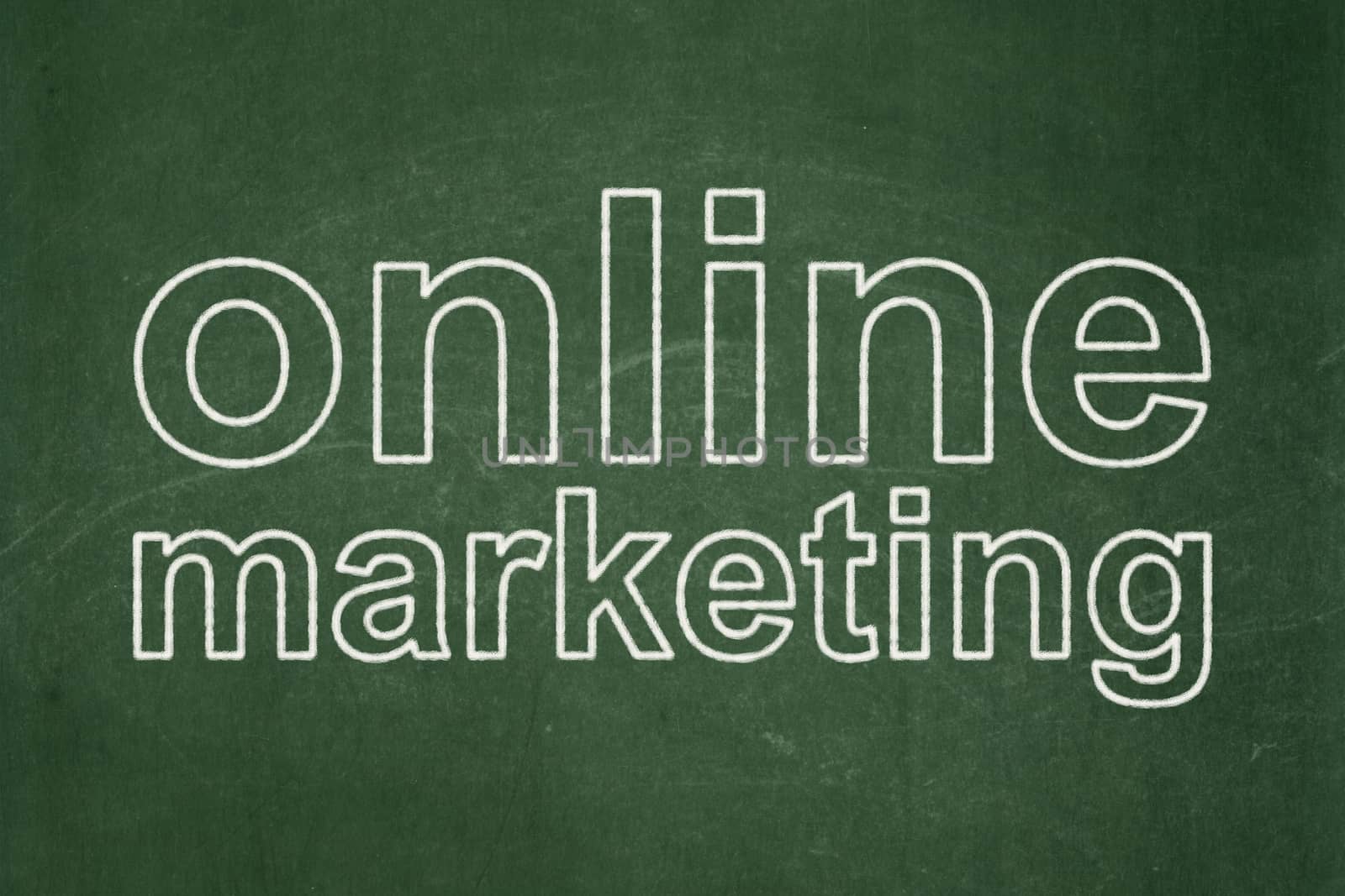 Advertising concept: text Online Marketing on Green chalkboard background