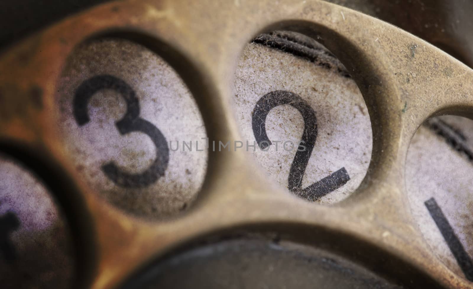 Close up of Vintage phone dial, dirty and scratched - 2, perspective