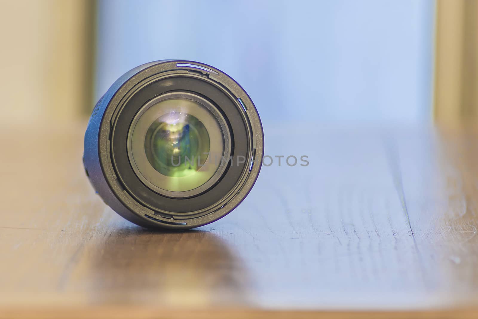 photo lens on a wood plain