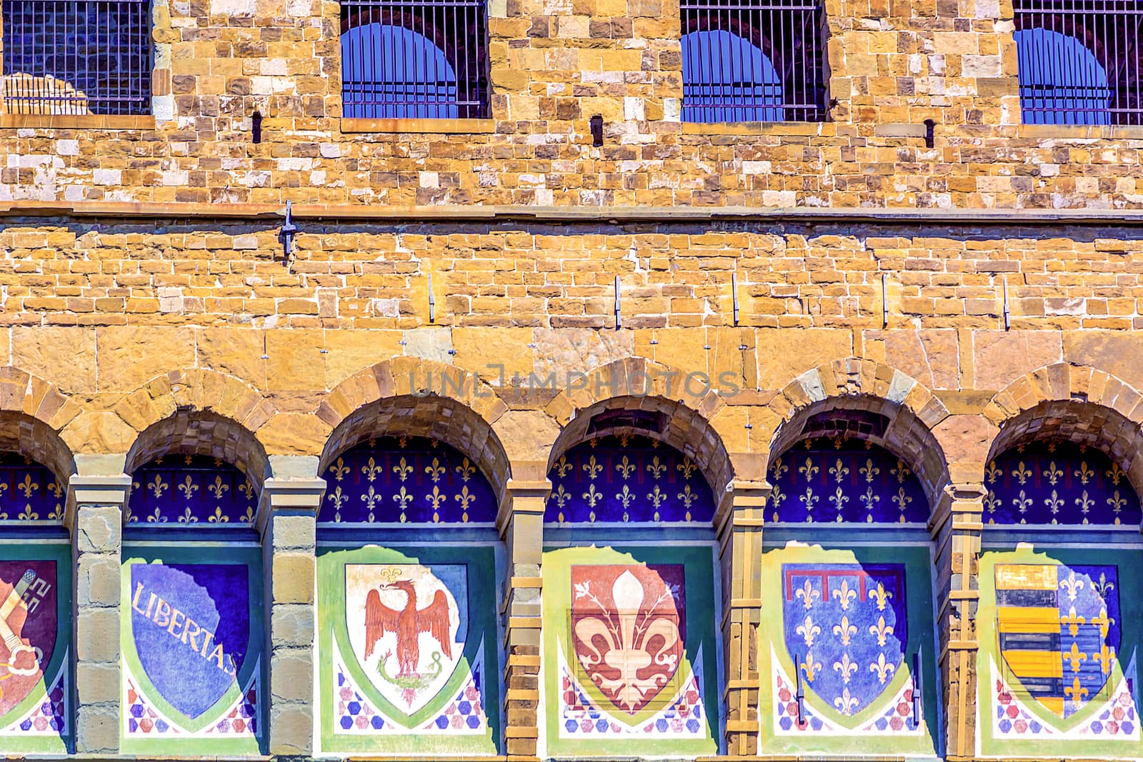 repeated series of painted coats of arms of the Florentine republic