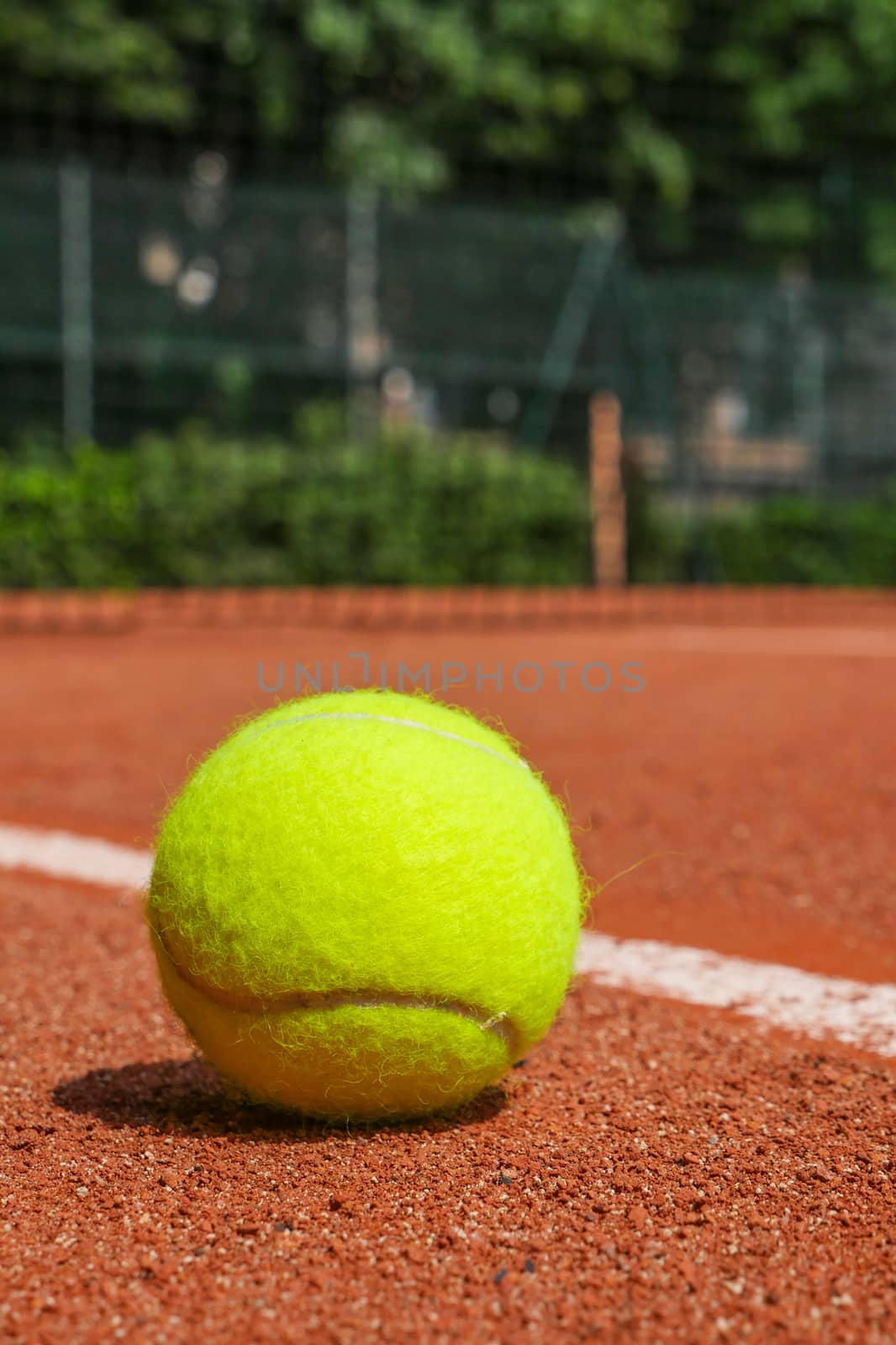 Tennis equipment on clay court, Paris, France