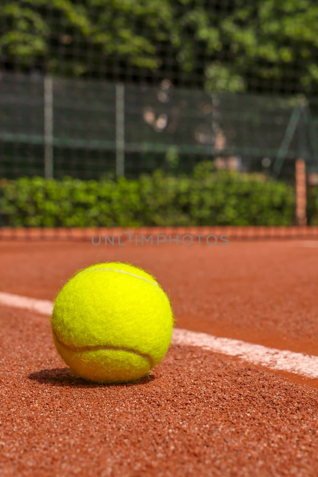 Tennis equipment on clay court, Paris, France