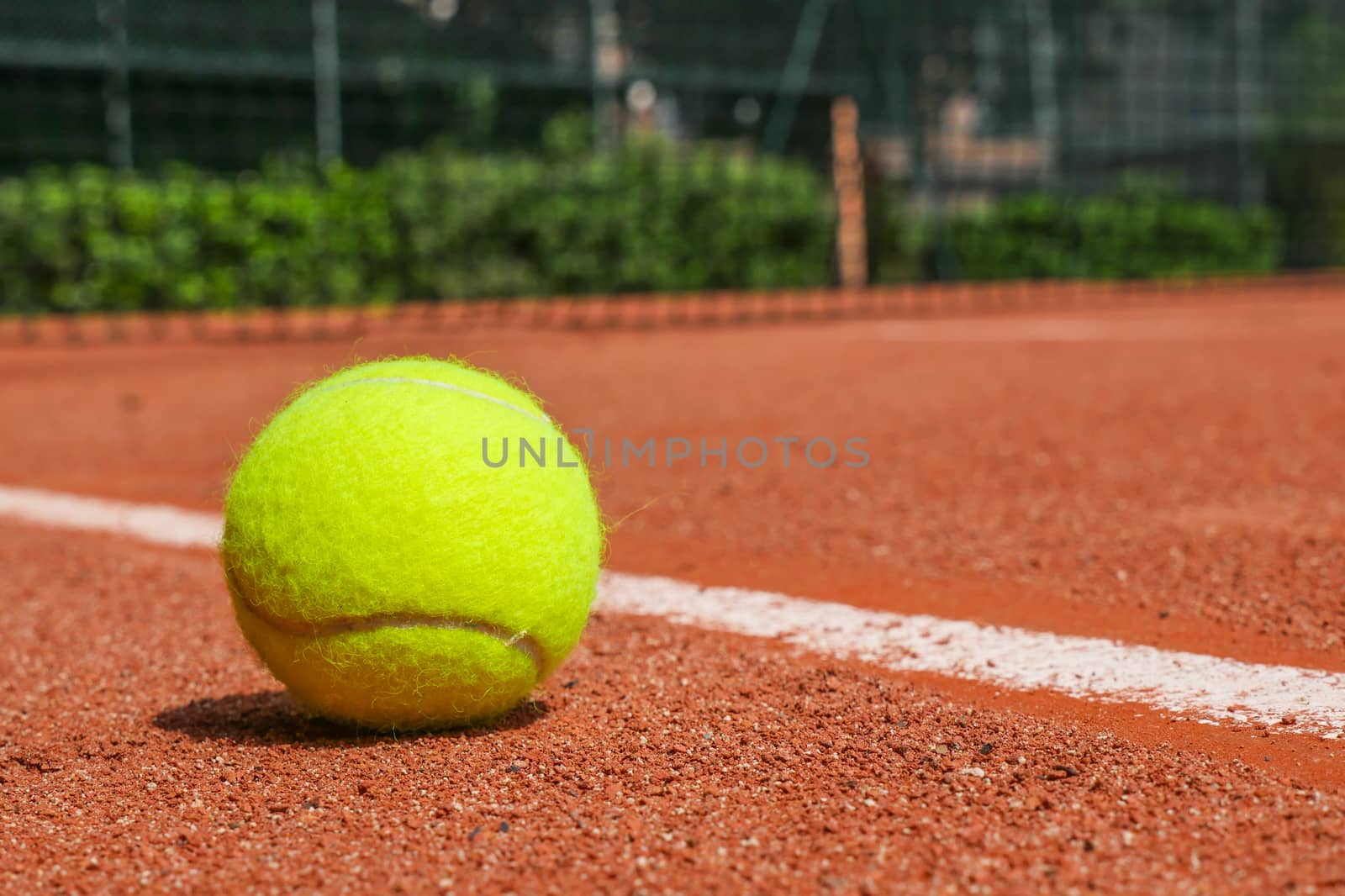 Tennis equipment on clay court, Paris, France