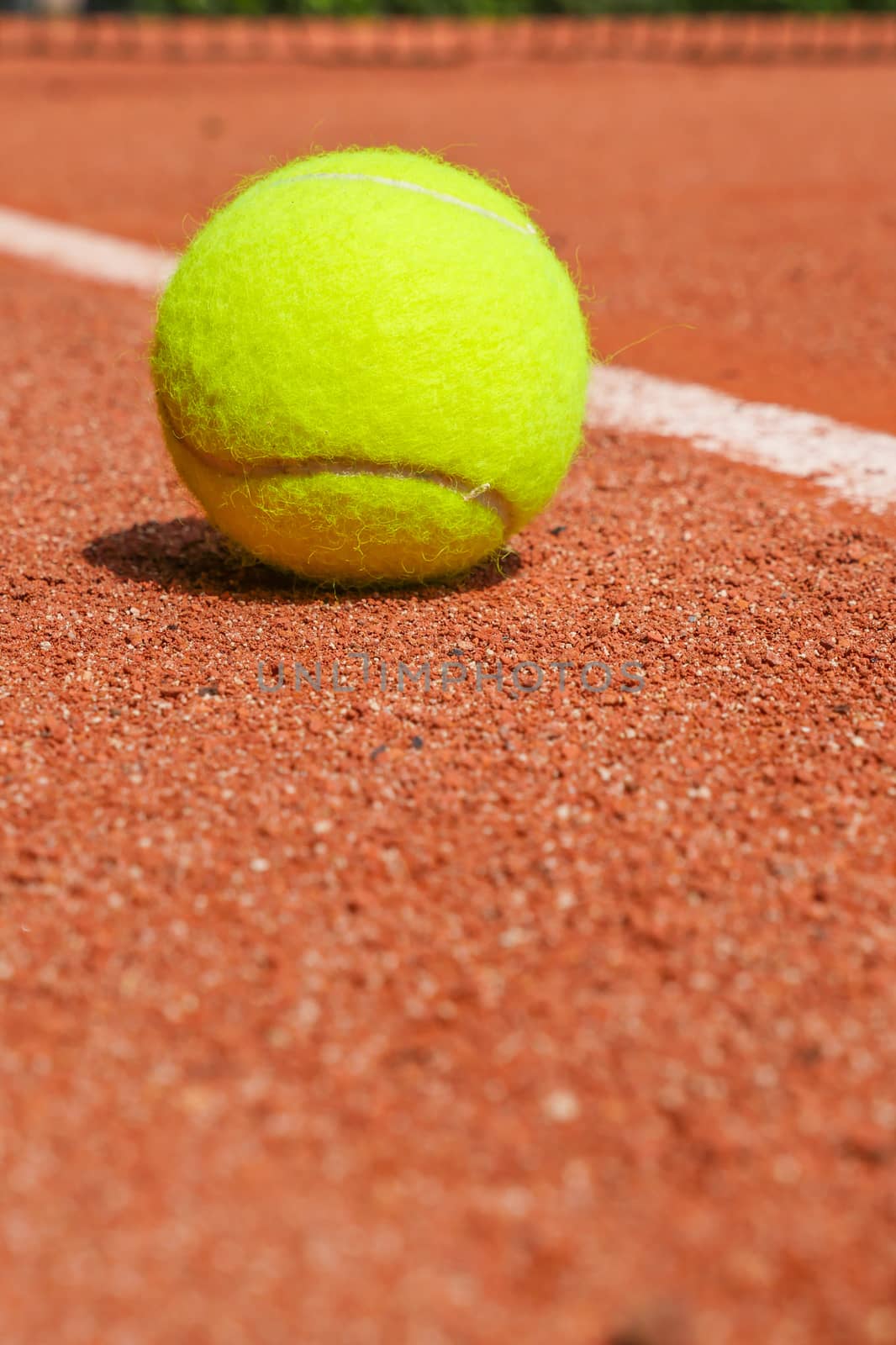 Tennis equipment on clay court, Paris, France