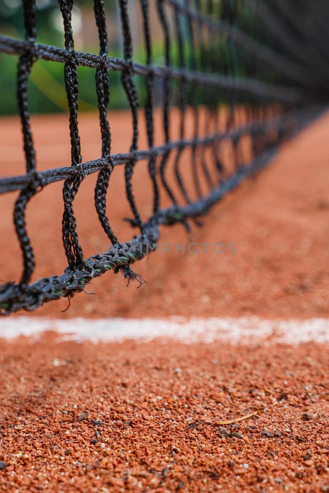 Tennis equipment on clay court, Paris, France