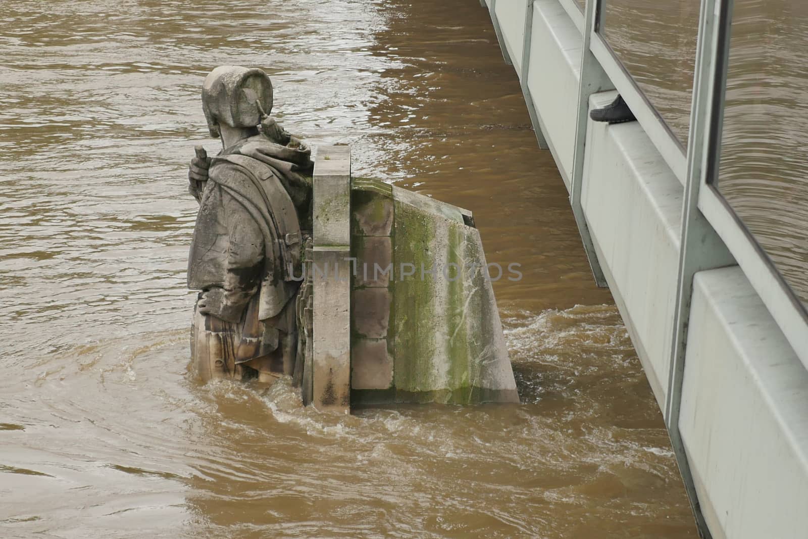 Zouave statue is most famous feature of Pont de Alma, Zouave statue shows how high Seine has risen.