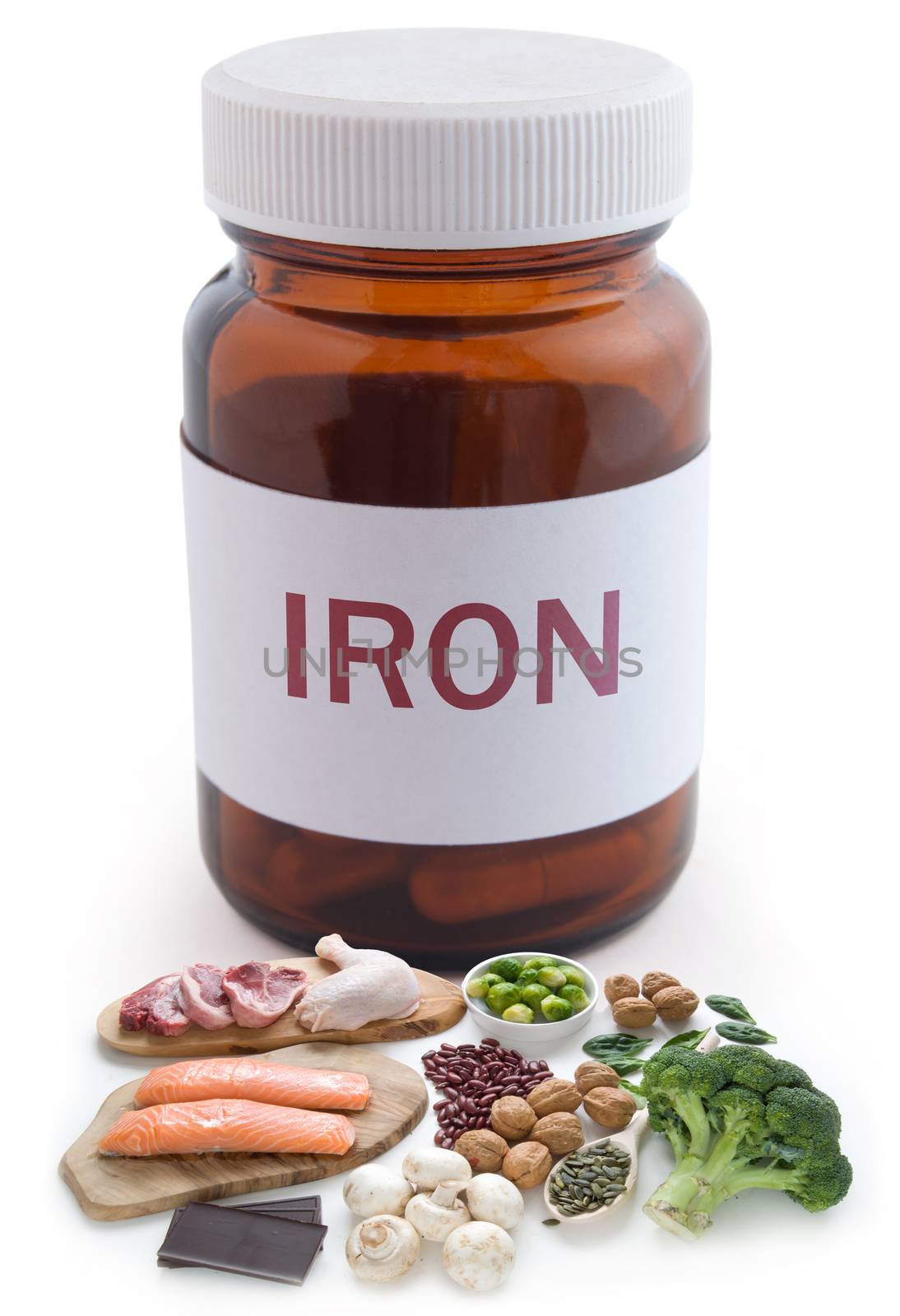 Iron supplements pill jar concept  by unikpix