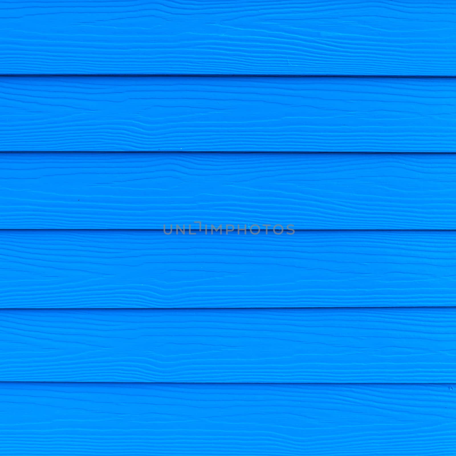 Scratched and dirty wood painted blue Wood plank texture backgro by nopparats