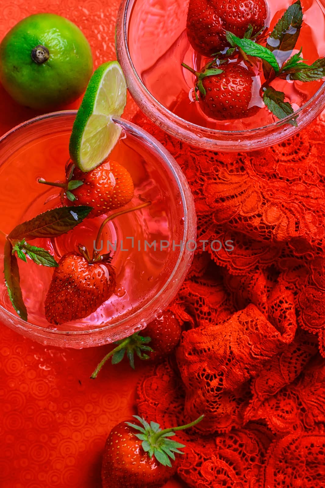 Martini glass with strawberries and red lace