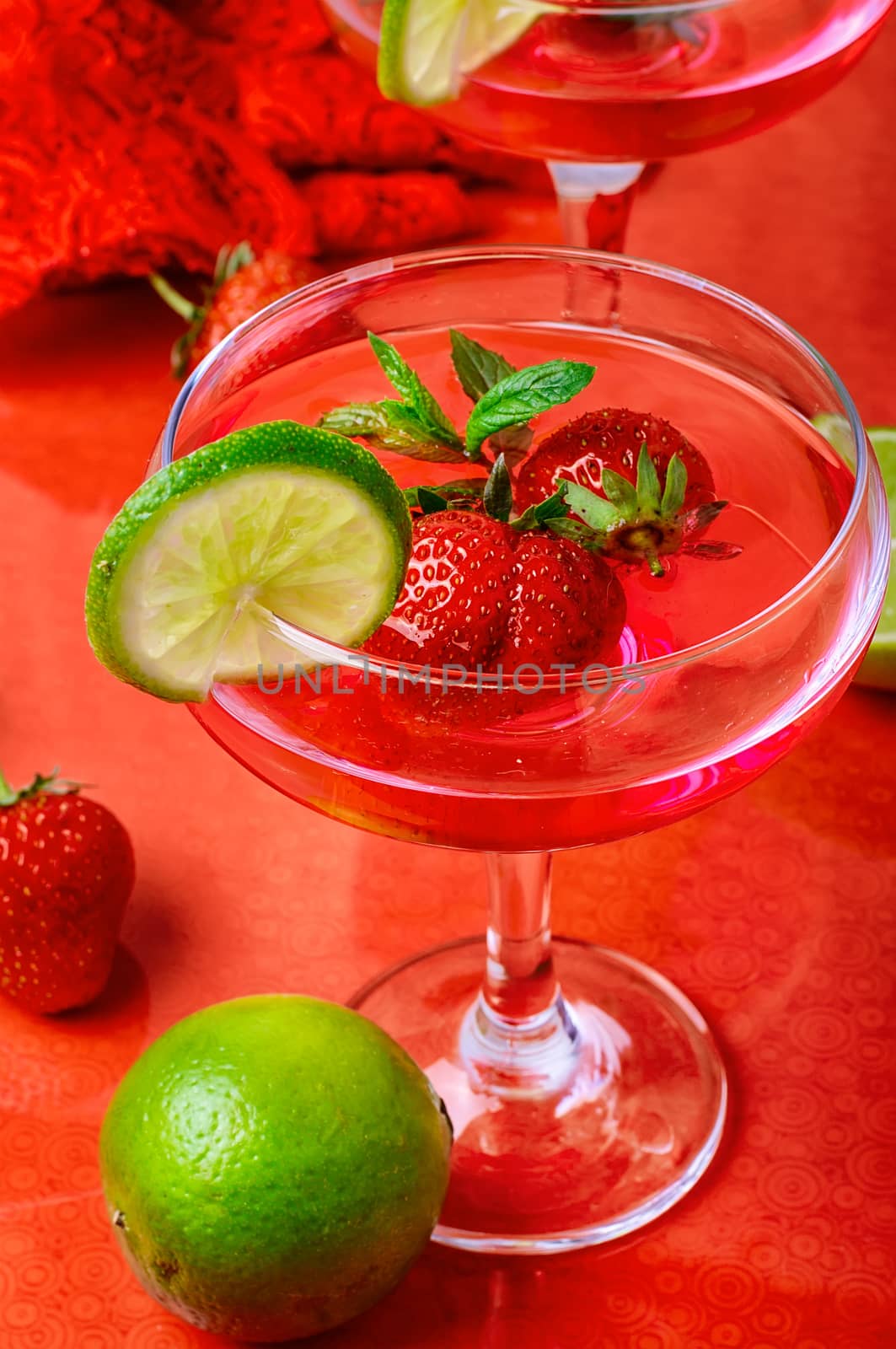 Martini glass with strawberries and red lace