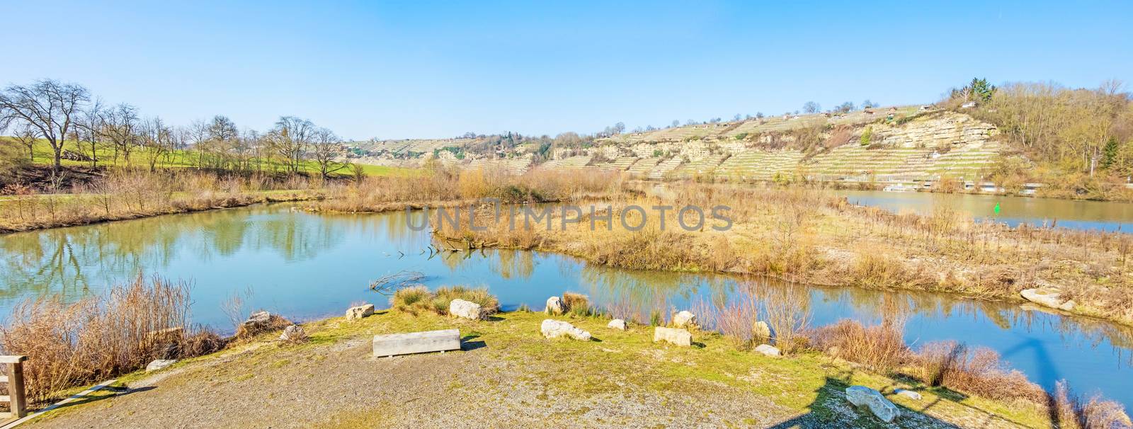 Poppenweiler, Germany - February 27, 2016: Natural reserve "Zugwiesen" tower with pier panorama near Poppenweiler, Ludwigsburg, Germany