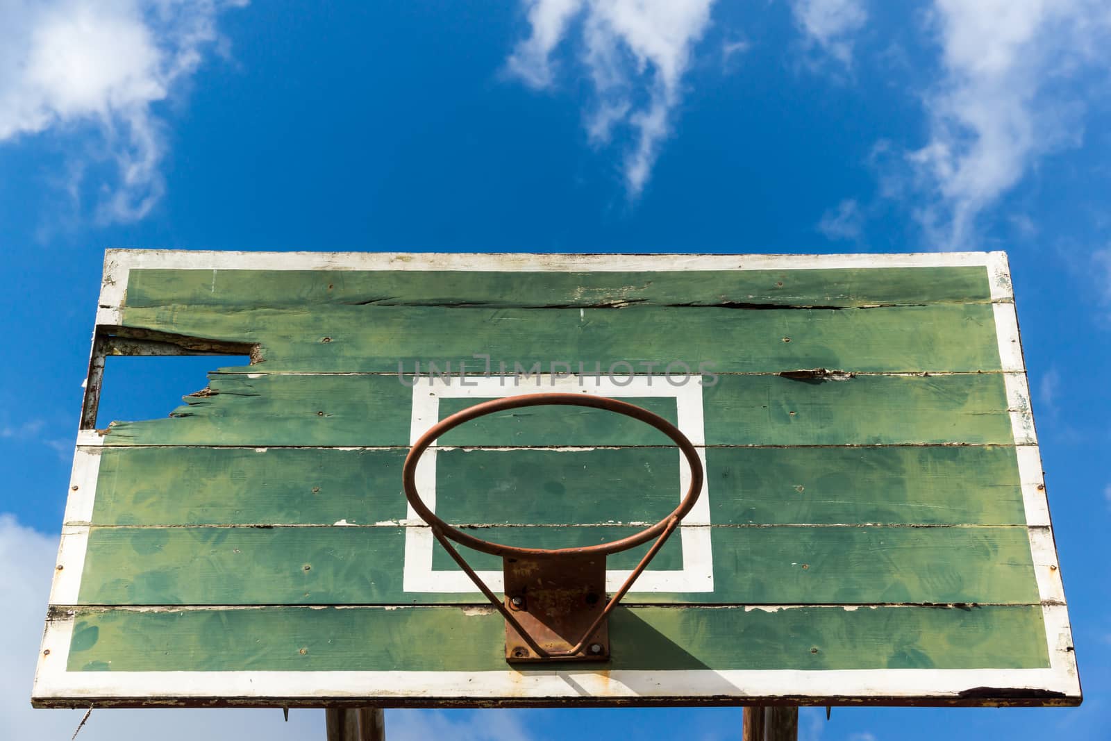 basketball hoop old and deteriorate by photoexplorer