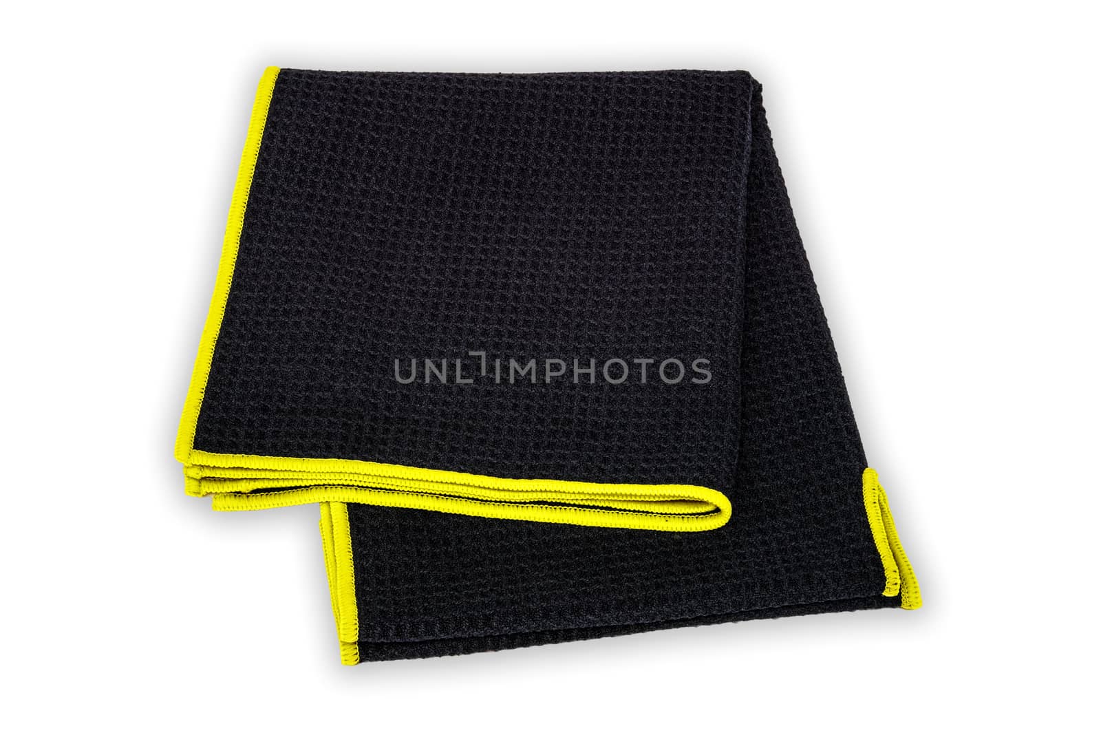 Black and yellow hand towel on white background
