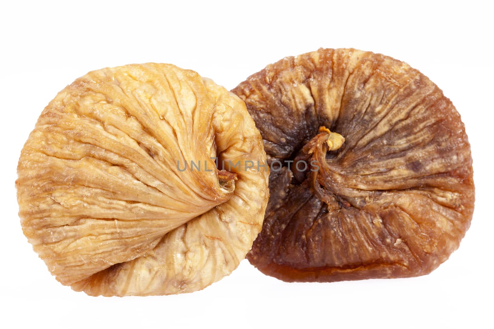 some fruits of dried fig isolated on white background.