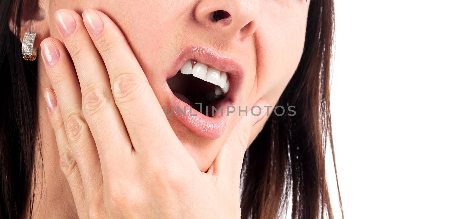 Woman with a toothpain, isolated on a white background
