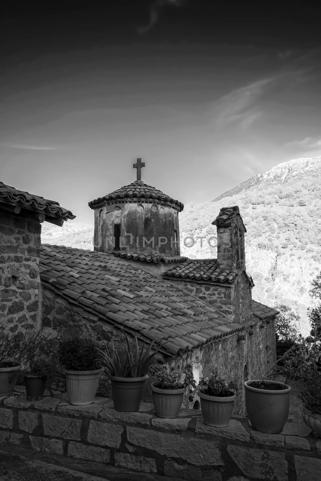 The New Philosophou Monastery was founded in 1691. The monastery with the remarkable carven chancel screen is located on the west side of Loussios Gorge.