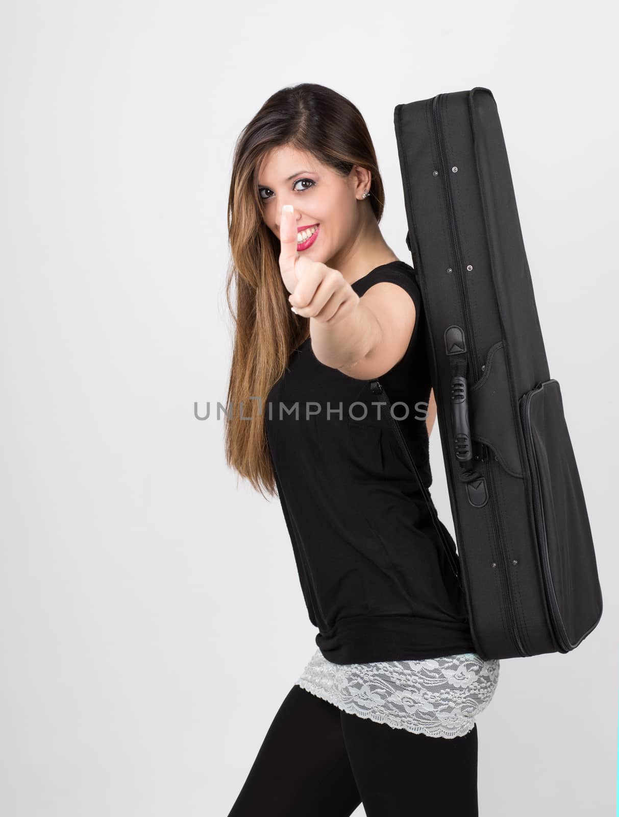 student girl with her instrument case say ok 