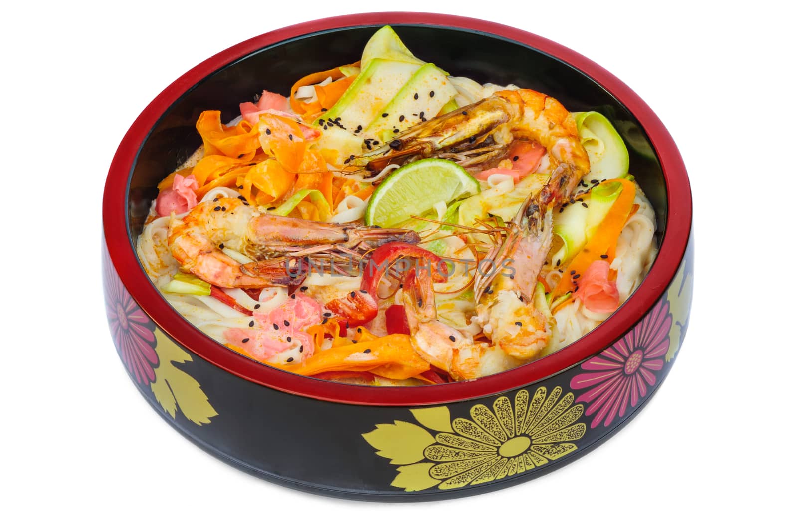 tagliatelle pasta with sea food in black bowl isolated on white background