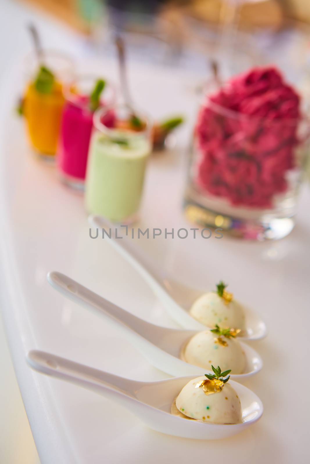 Appetizer pike caviar decorated with gold and green. Shallow dof