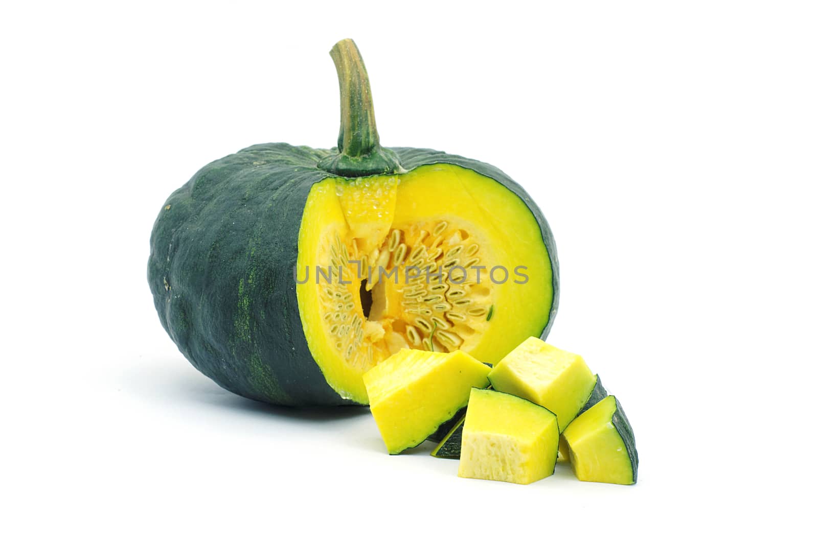 Sliced raw yellow pumpkin on white background. by ninelittle