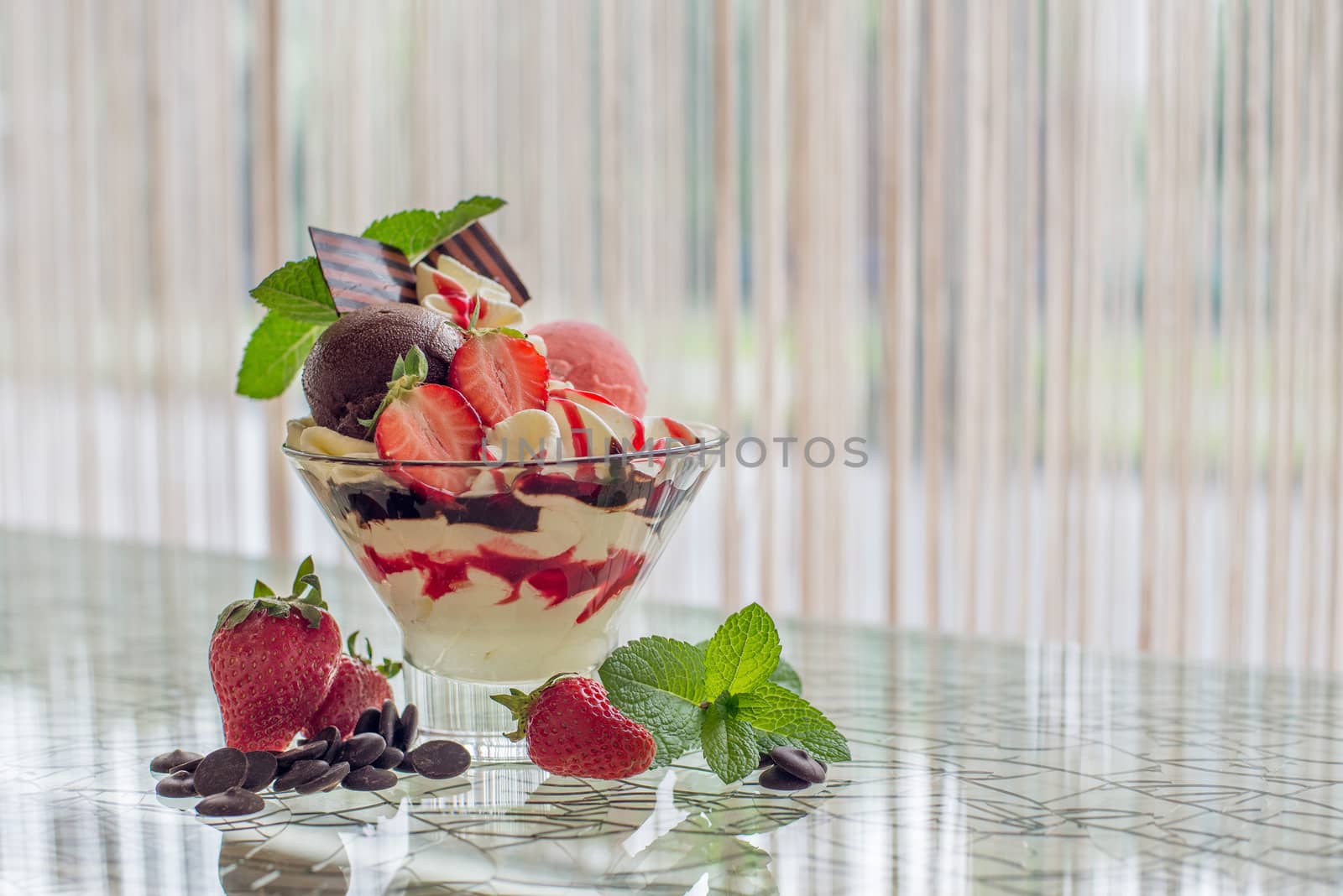 Delicious strawberry dessert with mint and chocolate