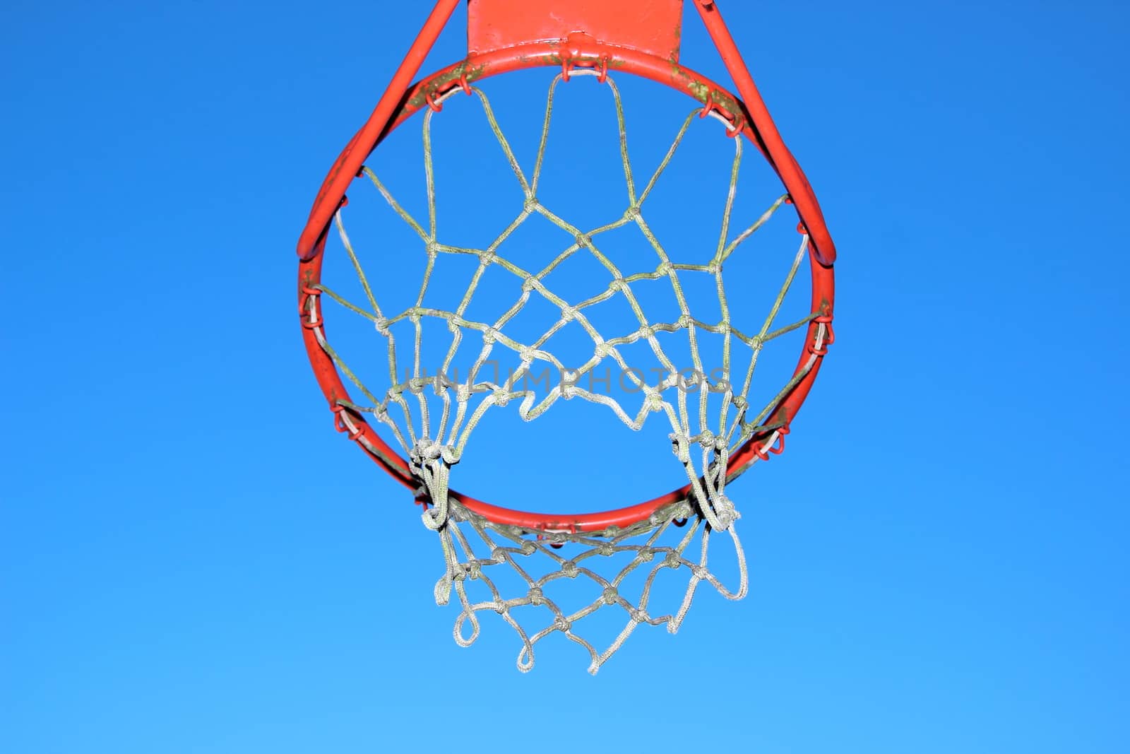 Isolated basketball net on blue sky background