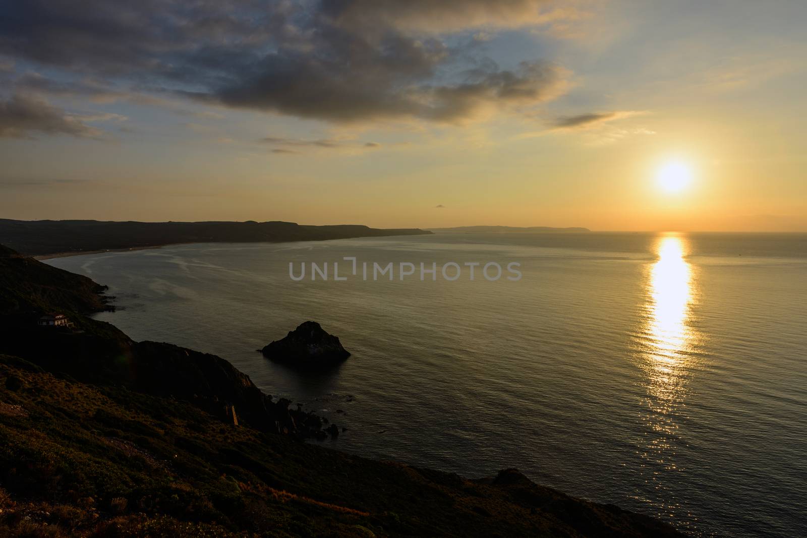 Ruins of industrial mining along the west coast of Sardinia. Panorama at sunset. The Marmora washery.