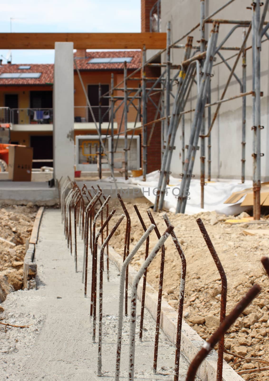 Concrete mould with metal spikes at construction site