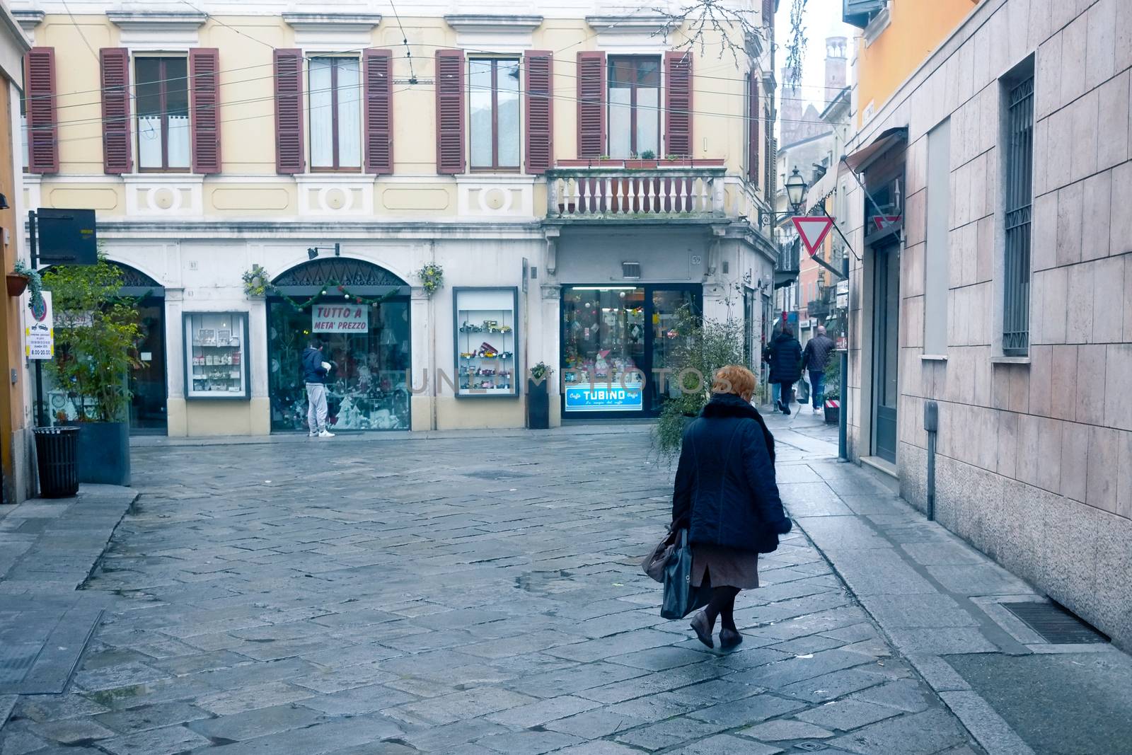 A woman walking alone in the city center