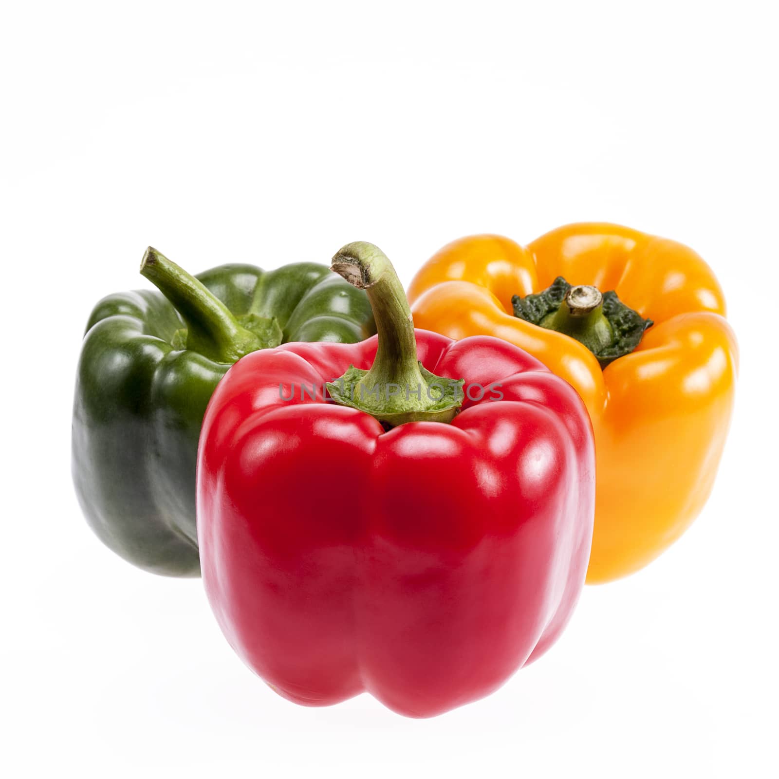 some  vegetables of colorful peppers isolated on white background, close up