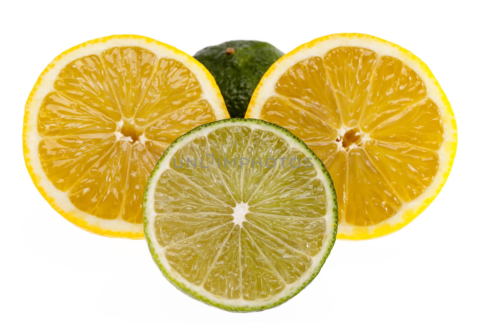 slices of  yellow lemons and green  limes isolated on white background