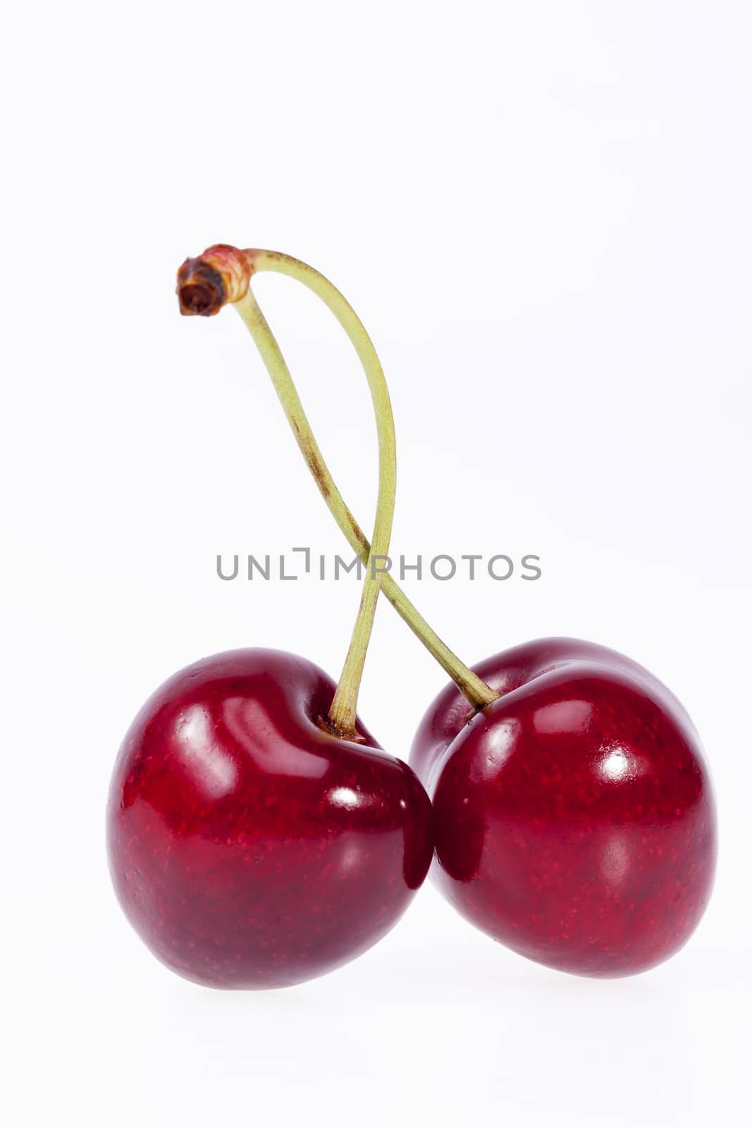 some fruits of red cherry isolated on white background.