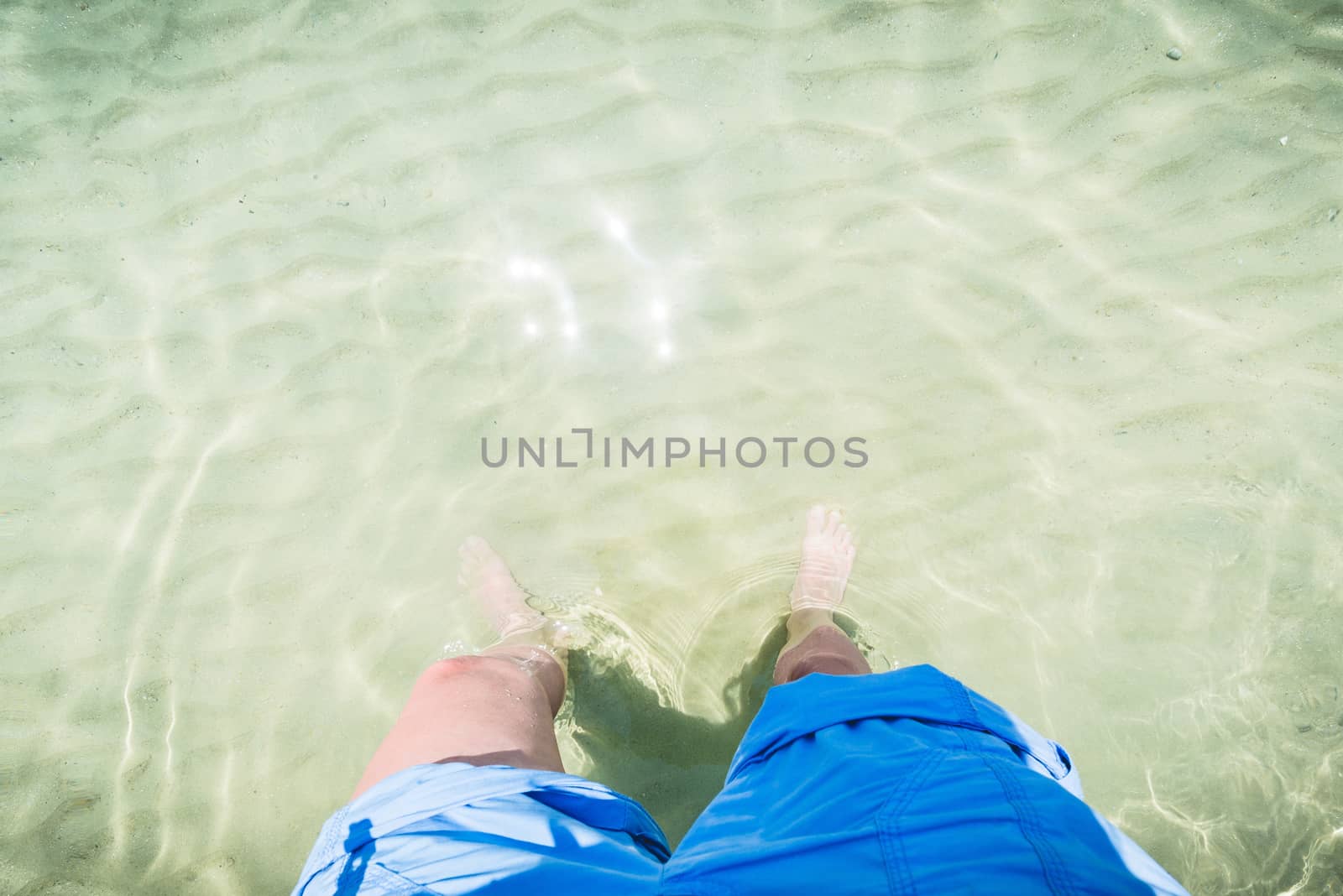 Legs in crystal water by Maurycy14