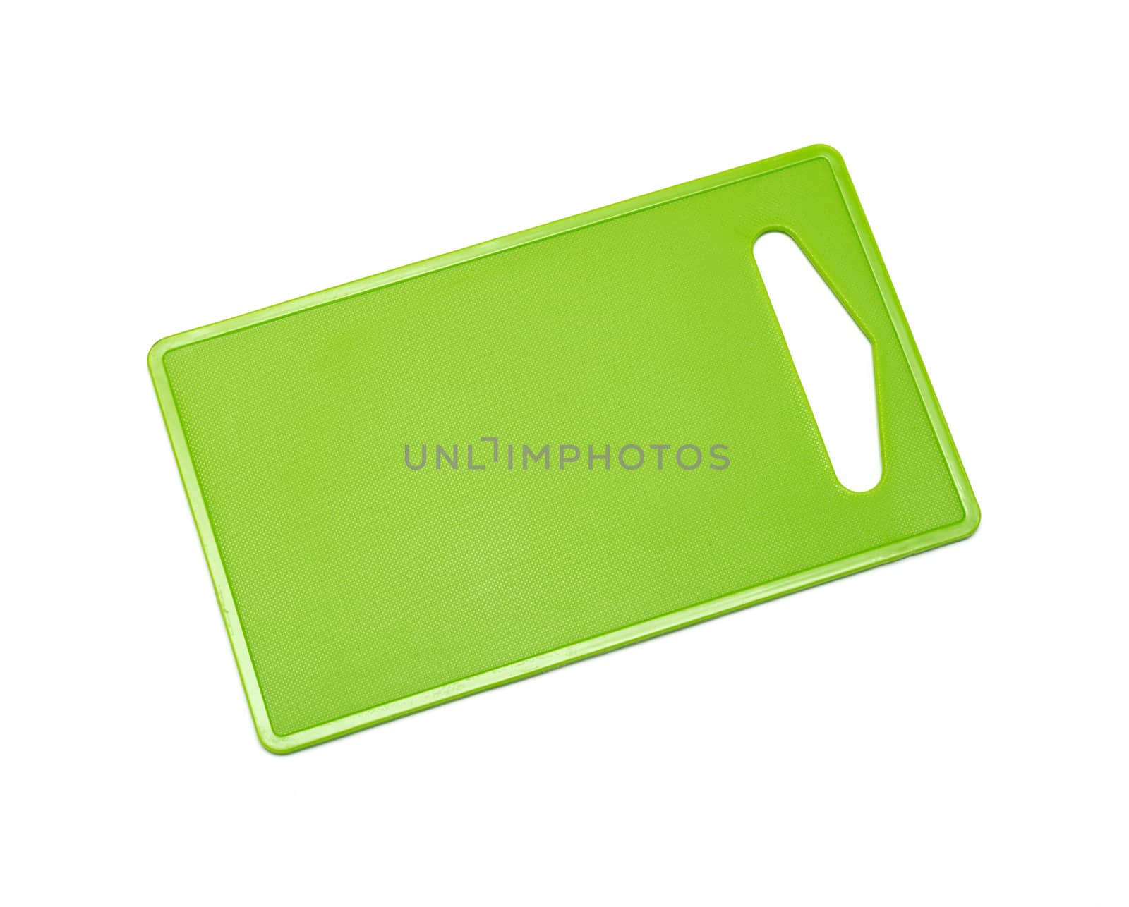 green plastic cutting board on a white background