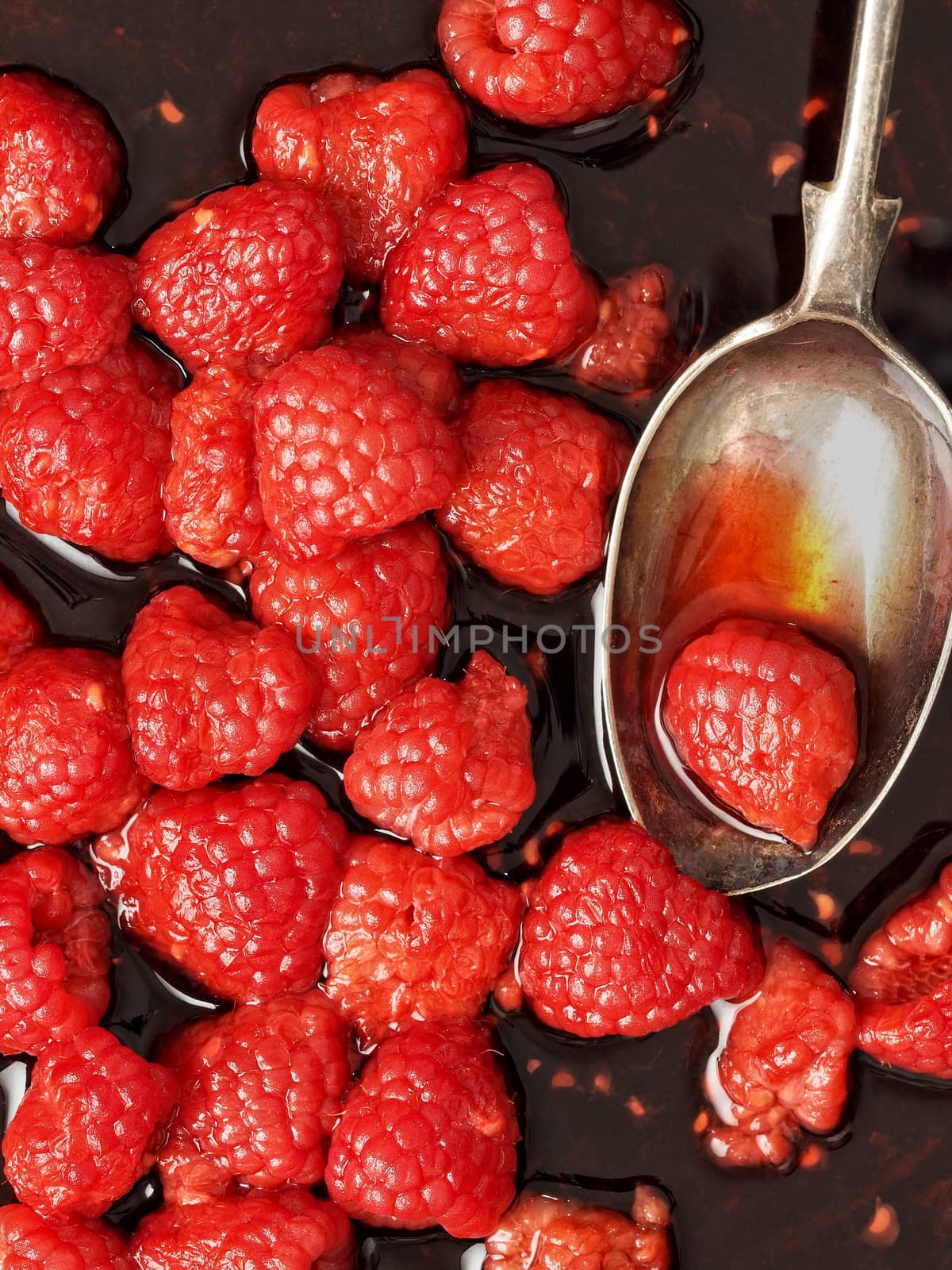 close up of rustic french raspberry fruit compote preserve