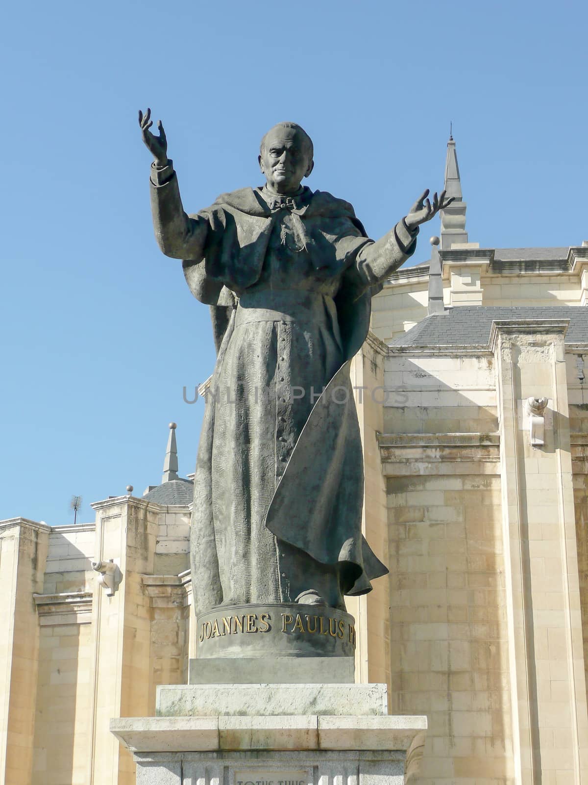 Statue of pope John Paul II (Karol Wojtyla) in front of Madrid Almudena Cathedral, Spain
