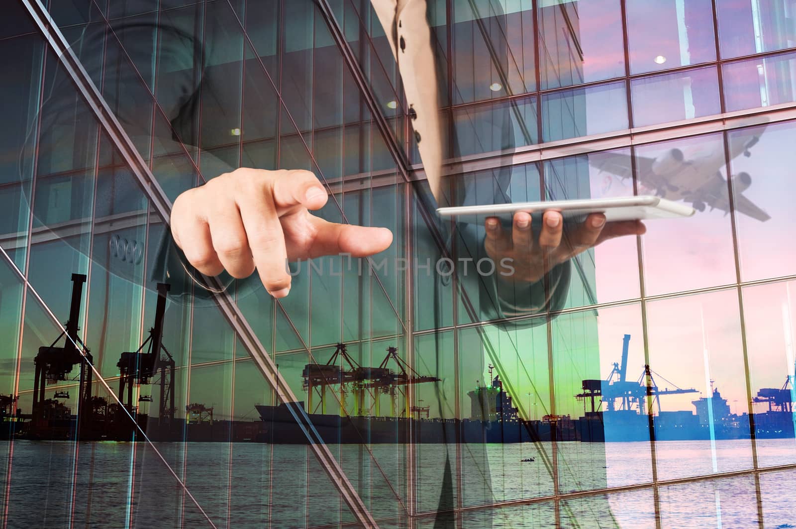 Double Exposure of Businessman with Digital Tablet and Port Cargo and Airplane as International Transportation or import and Export Business concept