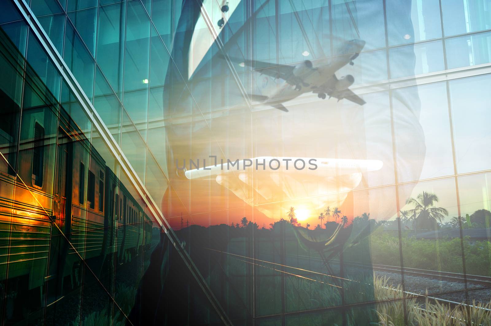 Double Exposure of BusinessMan Hold Tablet and Train, Airplane by thampapon