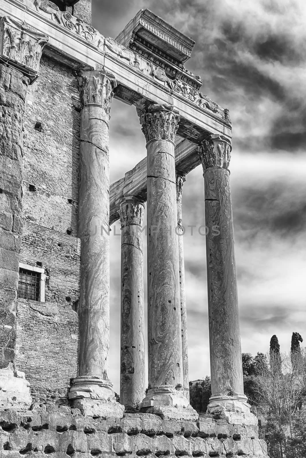 Ancient ruins of the Temple of Antoninus and Faustina inside the Roman Forum in Rome, Italy