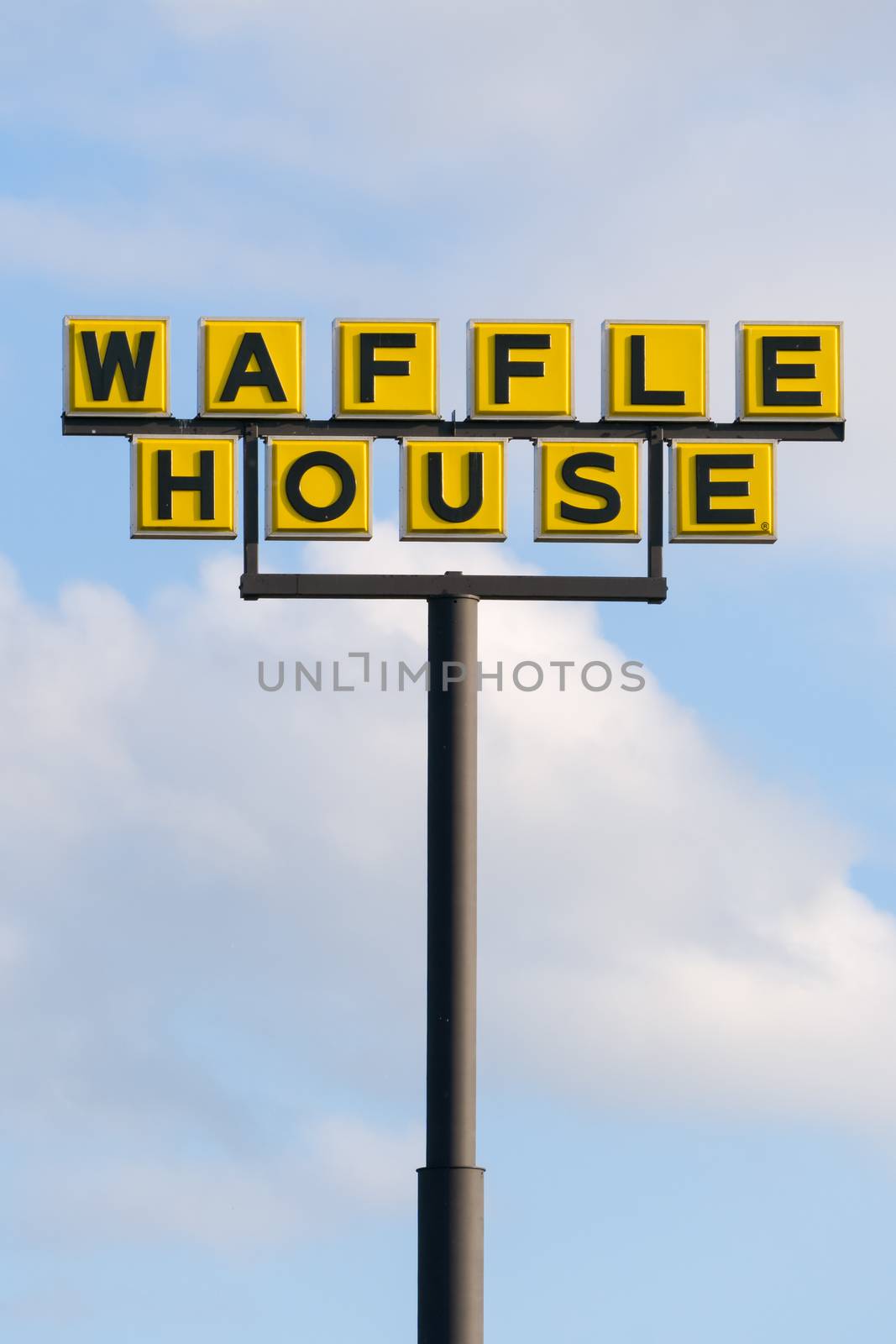 MOORE, OK/USA - MAY 20, 2016: Waffle House exterior sign and logo. Waffle House, Inc., is a restaurant chain with more than 2,100 locations in 25 states in the United States.